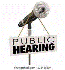 Microphone on stand with Public Hearing Notice 